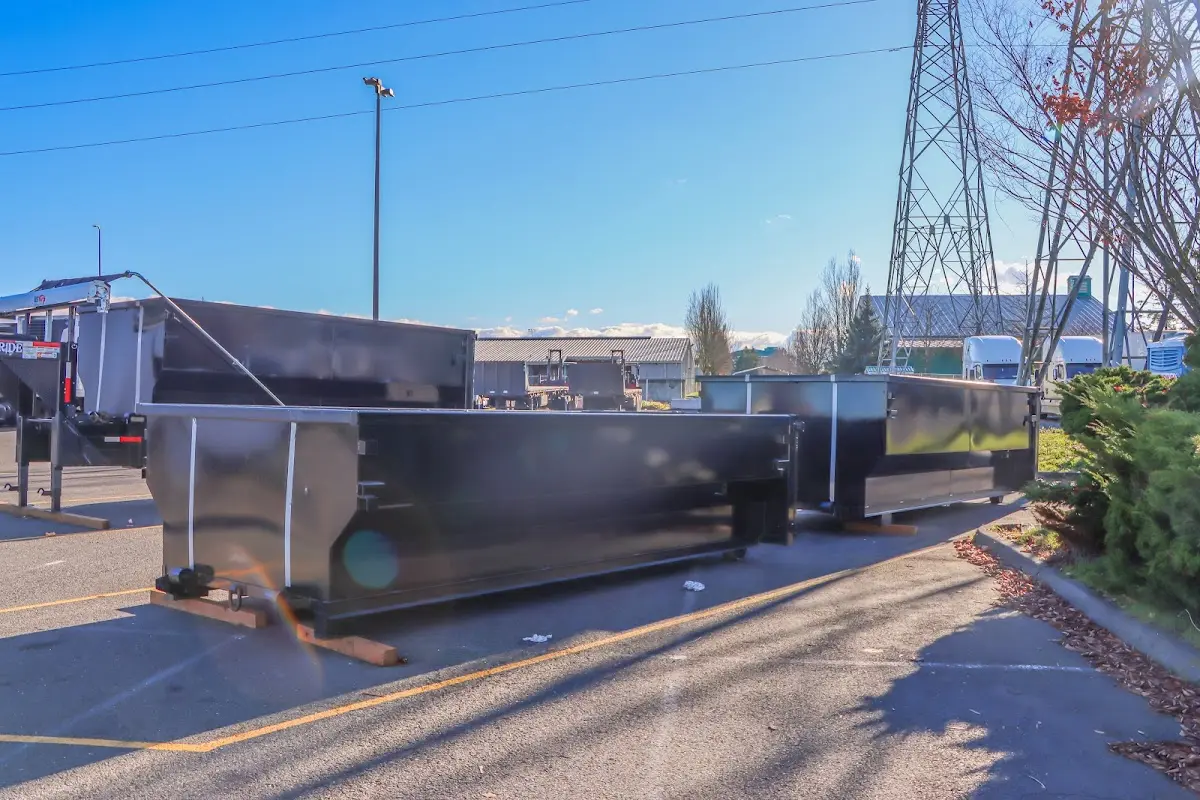 Roll-off dumpster ready for waste disposal at job site for Commercial Dumpster Rental in Celebration